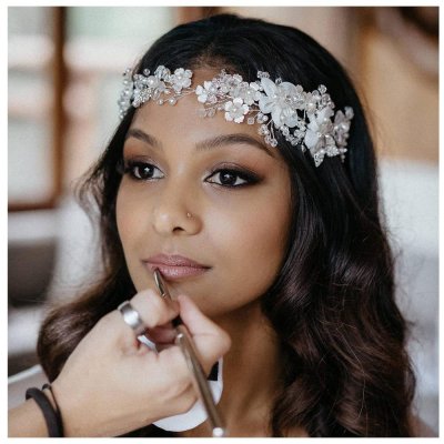 The Bride Wore A Silver Wedding Headpiece
